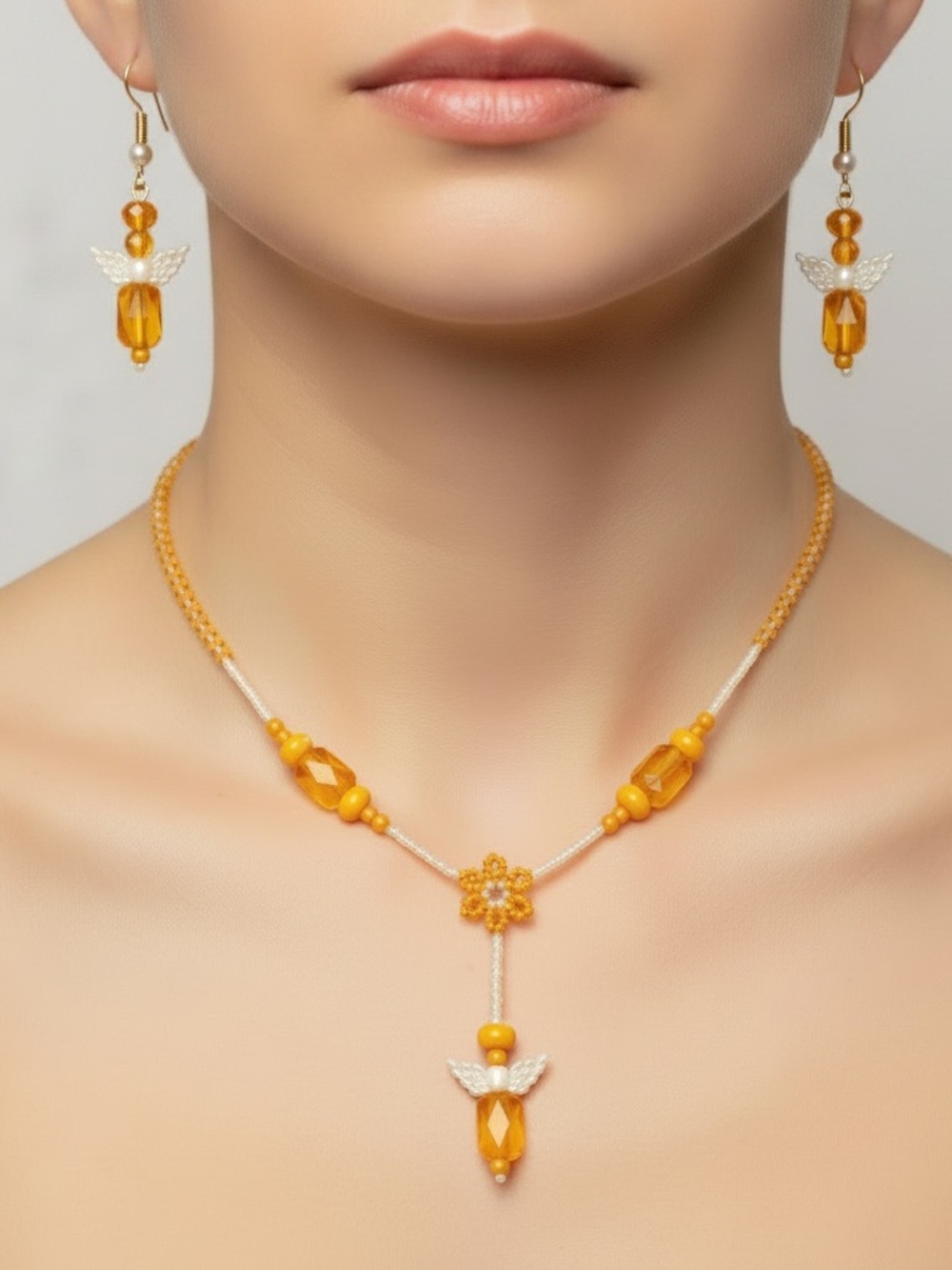 Handcrafted Orange Beaded Necklace, angel wing pendent by Patience’s Jewelry Box